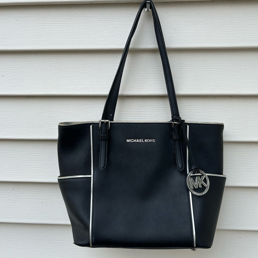 Michael Kors Black daffiano leather tote with silver trim.